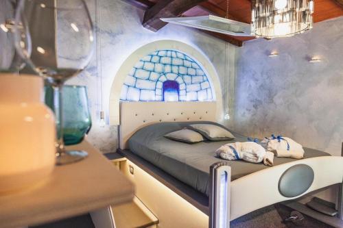 Кровать или кровати в номере Terre Dell'Amore