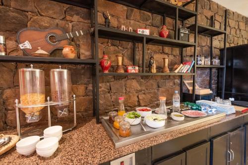 Ibis Ouarzazate Centreにあるキッチンまたは簡易キッチン