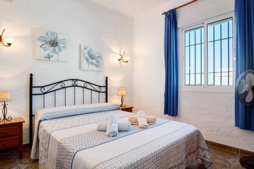 Ένα ή περισσότερα κρεβάτια σε δωμάτιο στο Las Calas de Roche