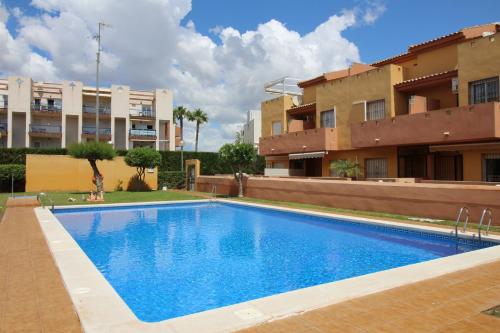 Sundlaugin á Cabo Roig, Orihuela costa, Apartamento de tres dormitorios con piscina, Gestionado Por Elvira Home eða í nágrenninu