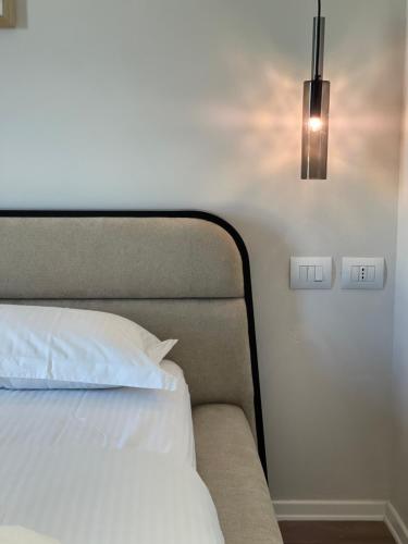 Ένα ή περισσότερα κρεβάτια σε δωμάτιο στο Square INN Garden Aparthotel
