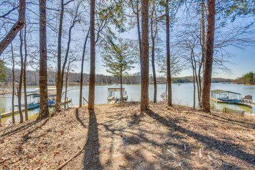 a view of a lake with trees and a dock at Lake Hartwell Retreat with 2-Tier Dock and Boat Slip! in Seneca