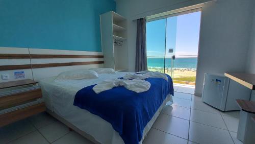 Cama ou camas em um quarto em Hotel Pousada Agua Marinha