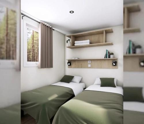 two beds in a room with green sheets at Mobilhome 3 étoiles - Piscine - eehfif in Vic-la-Gardiole