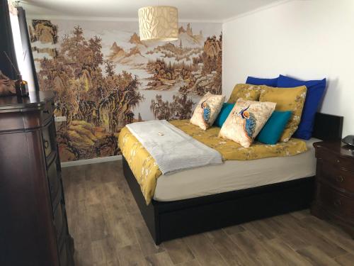 Postel nebo postele na pokoji v ubytování Spa Aphrodite, Wohlfühlen und Wellness mit Privatsphäre, sowie Homeoffice Arbeitsplatz mit schnellem 250 Mbit WLAN