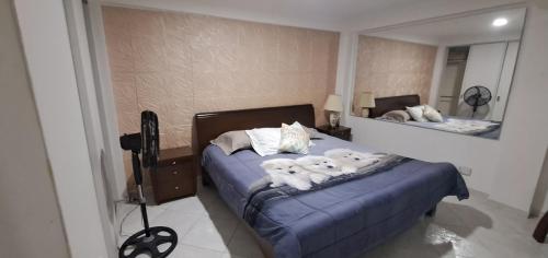 Cama o camas de una habitación en Amplio y lindo apartamento