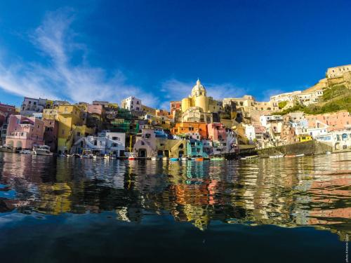 a view of a city from the water at Palazzo Palumbo in Procida
