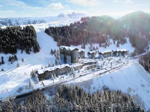 an aerial view of a resort in the snow at Résidence L'ariondaz - 3 Pièces pour 6 Personnes 194 in Courchevel