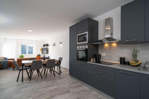 Kuchyň nebo kuchyňský kout v ubytování The Loft