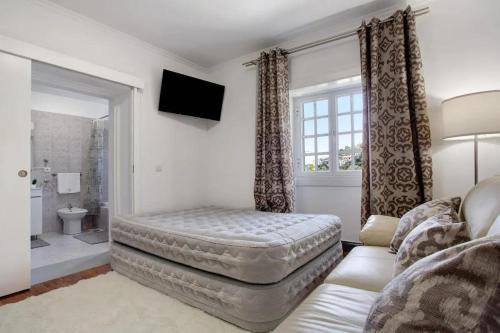 Ένα ή περισσότερα κρεβάτια σε δωμάτιο στο Sea La Vie House