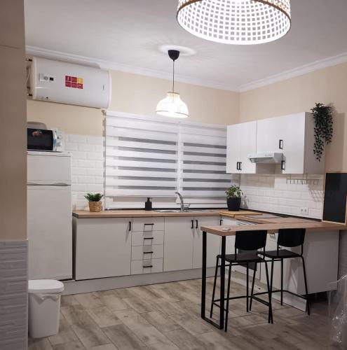 Dapur atau dapur kecil di Suite Huelva garden