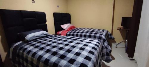 Cama o camas de una habitación en Hostal Cadena