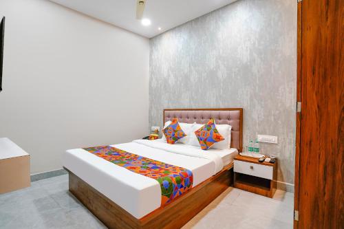 Una cama o camas en una habitación de Hotel Affari