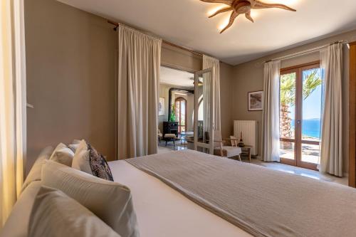 A bed or beds in a room at Helios Selene