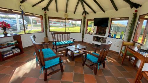 Posezení v ubytování Finca-Hotel Villa Mariana en Boyacá