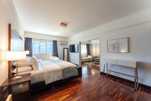 מיטה או מיטות בחדר ב-Hotel Tolosa