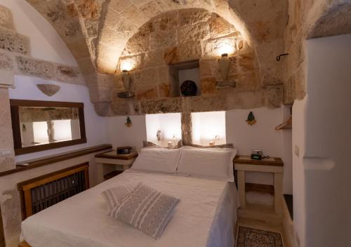 Ένα ή περισσότερα κρεβάτια σε δωμάτιο στο Villa Torretta San Martino