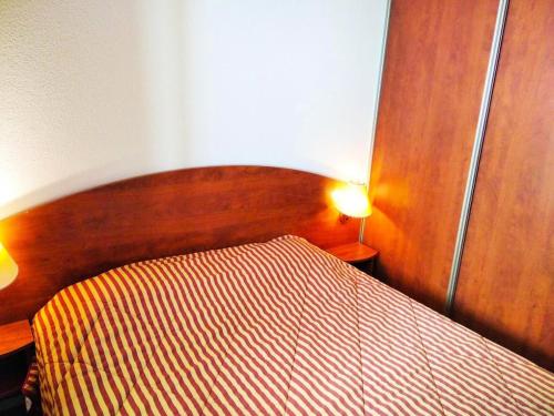 Posteľ alebo postele v izbe v ubytovaní Résidence Pic Du Midi - 2 Pièces pour 4 Personnes 754