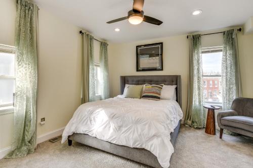 a bedroom with a bed and a ceiling fan at Charming Baltimore Getaway about 1 Mi to Downtown! in Baltimore