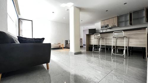 Η κουζίνα ή μικρή κουζίνα στο Hotel Urban Cholula