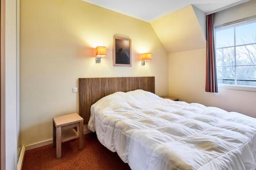 Posteľ alebo postele v izbe v ubytovaní Résidence Le Green Beach - maeva Home - 3 Pièces 6 Personnes Confort MAE-3005