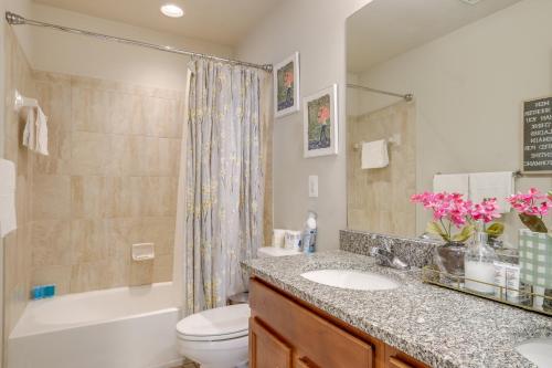 a bathroom with a sink and a toilet and a shower at Spacious Woodbridge Home Near Leesylvania Park! in Woodbridge