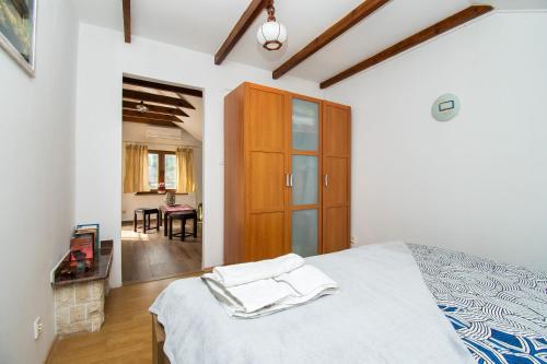 Ένα ή περισσότερα κρεβάτια σε δωμάτιο στο Apartments Adriaaticoo