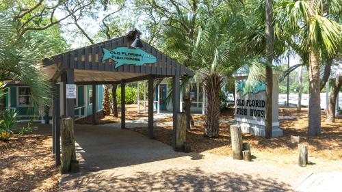 a sign that says no seafood is allowed in the park at Sans Souci by 30A Escapes in Seacrest