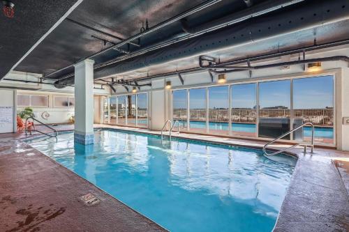 a large pool with blue water in a building at Royal Palms 907 in Gulf Shores