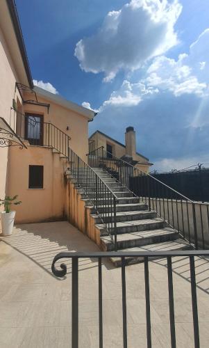 a set of stairs on the side of a building at Dimora Storica Apartments in Ruviano
