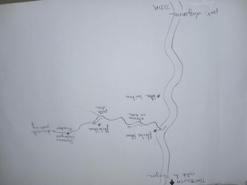 a drawing of a river on a white wall at La pirogue enchantée in Païta