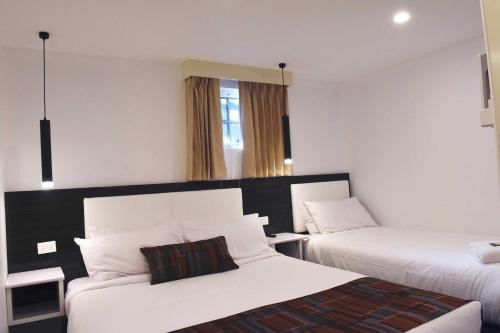Katil atau katil-katil dalam bilik di Buckingham Apartments