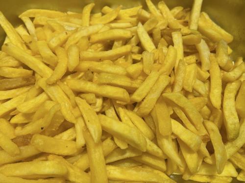 a pile of french fries in a bowl at Hotel Hoa Nắng in Bao Loc