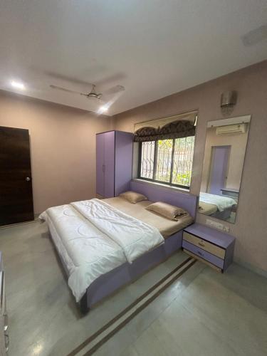 Cama ou camas em um quarto em JP Villa