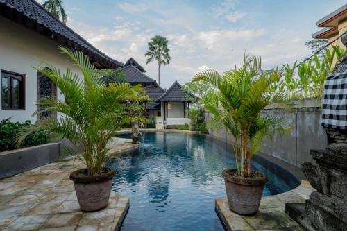 Bazén v ubytování Oma Ubud nebo v jeho okolí