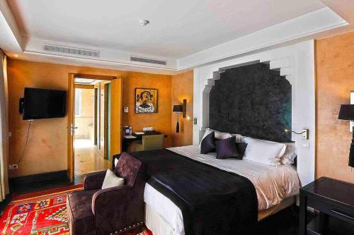 Krevet ili kreveti u jedinici u objektu Somptueux Riad dans Resort 5 étoiles