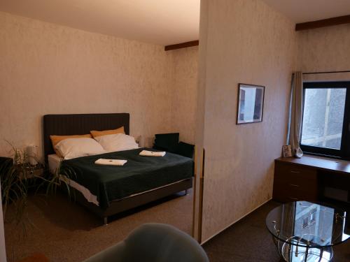 Katil atau katil-katil dalam bilik di Hotel Radnice