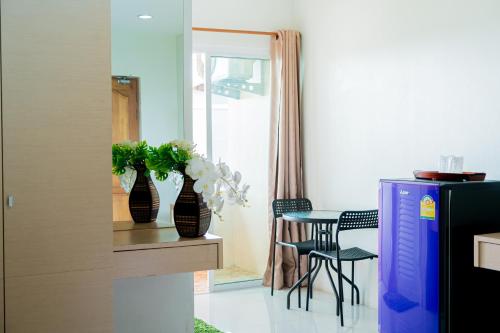 Kuchyň nebo kuchyňský kout v ubytování The Infinity Suite Chiangrai