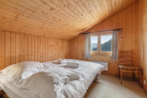 Postel nebo postele na pokoji v ubytování Chalet spacieux et pittoresque