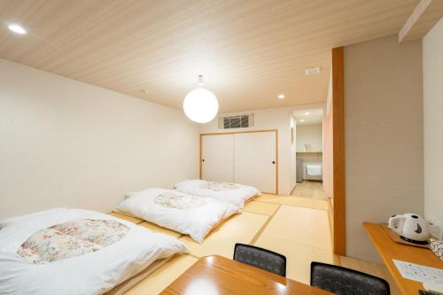 Postel nebo postele na pokoji v ubytování Fuji Shoei Hall - Vacation STAY 09374v