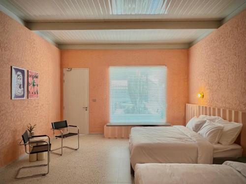 Ένα ή περισσότερα κρεβάτια σε δωμάτιο στο Palm Springs Villa Pranburi