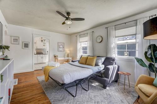 a living room with a bed and a couch at Colorado Cottage - Downtown King Scenic in Colorado Springs