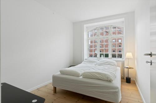 Postel nebo postele na pokoji v ubytování Come Stay Charming 2 BR - Near Frederiksberg