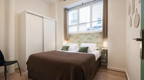Posteľ alebo postele v izbe v ubytovaní Panthéon Modern and exclusive 3BD