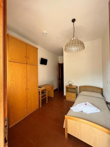 Postel nebo postele na pokoji v ubytování Albergo Dalla Mena