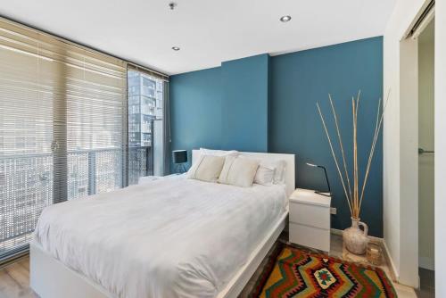 Katil atau katil-katil dalam bilik di Modern City Convenience with Great Amenities