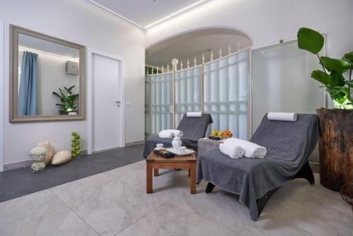 Posezení v ubytování Casa Raiola Ercolano Luxury Rooms & Spa