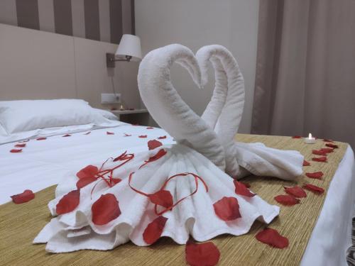 Postel nebo postele na pokoji v ubytování Hotel San Lorenzo Boutique