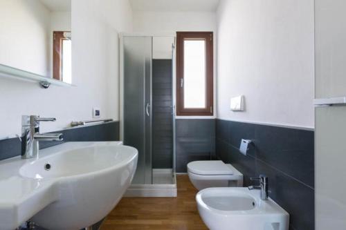 Koupelna v ubytování Appartamento del Tramonto by Le Dune Villas