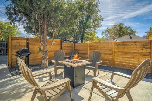 a patio with a table and chairs and a fire pit at Kiowa Studio - Downtown Pet-Friendly BBQ Fire Pit in Colorado Springs